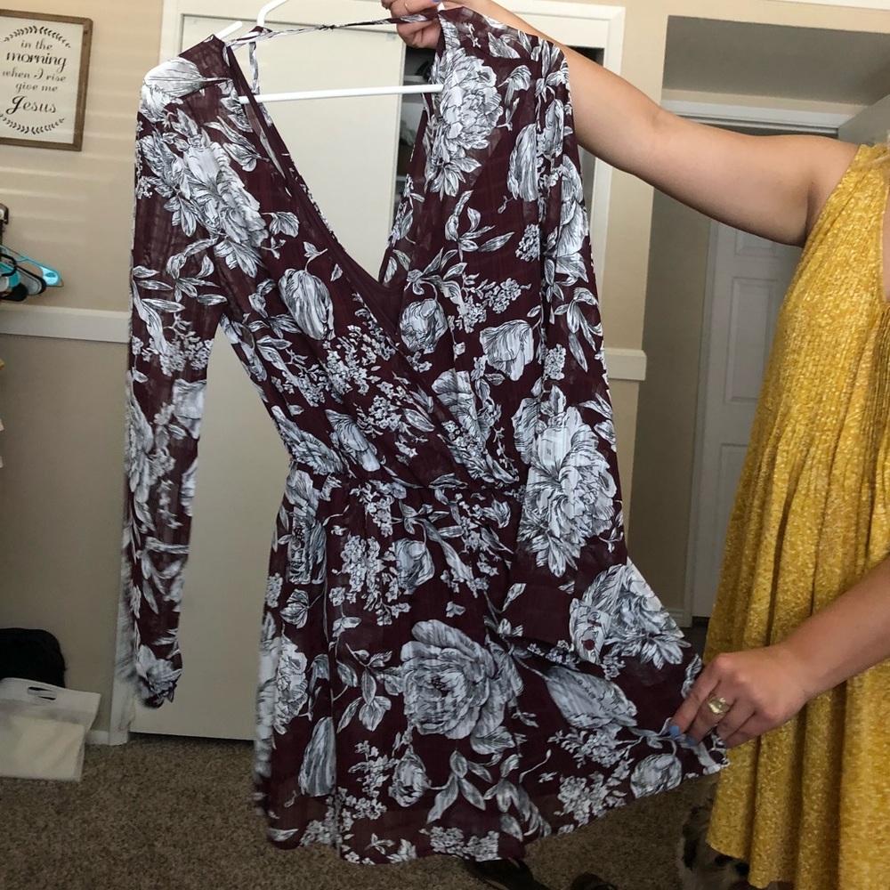 ASTR low V floral romper.